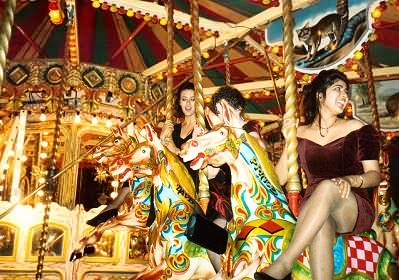 Tara, Maria and Malika on the roundabout...