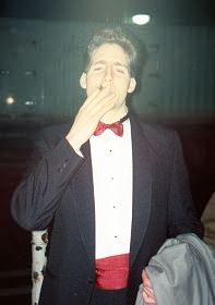 Ben smoking a cigar.