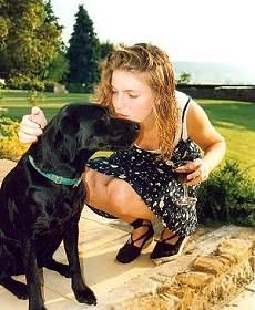 Ellie in love clinch with black labrador....