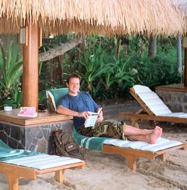 Dan in a sarong on the beach.